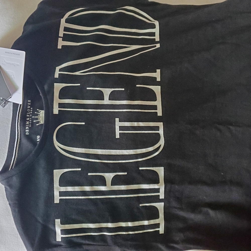 NWT Empowerment Tshirt by Ricky Singh. Size 9/10 boys or S/M woman.